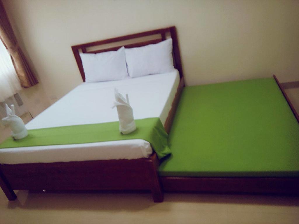 Gilin Pension House Puerto Princesa Екстер'єр фото